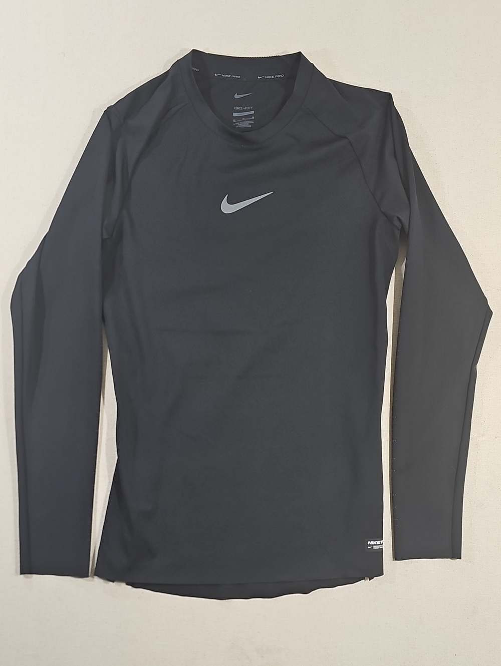 Nike Black Long Sleeve Dri-FIT Top with Silver Swoosh